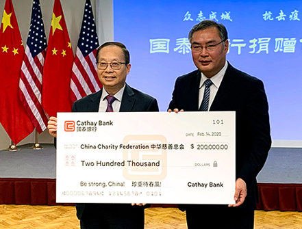 Pin Tai (left), Chief Executive Officer of National Graphic Islamic Bank, presented donation check to Zhang Ping (right), the Consul General of the Consulate General of the People's Republic of China in Los Angeles, in support of the coronavirus control efforts in China.